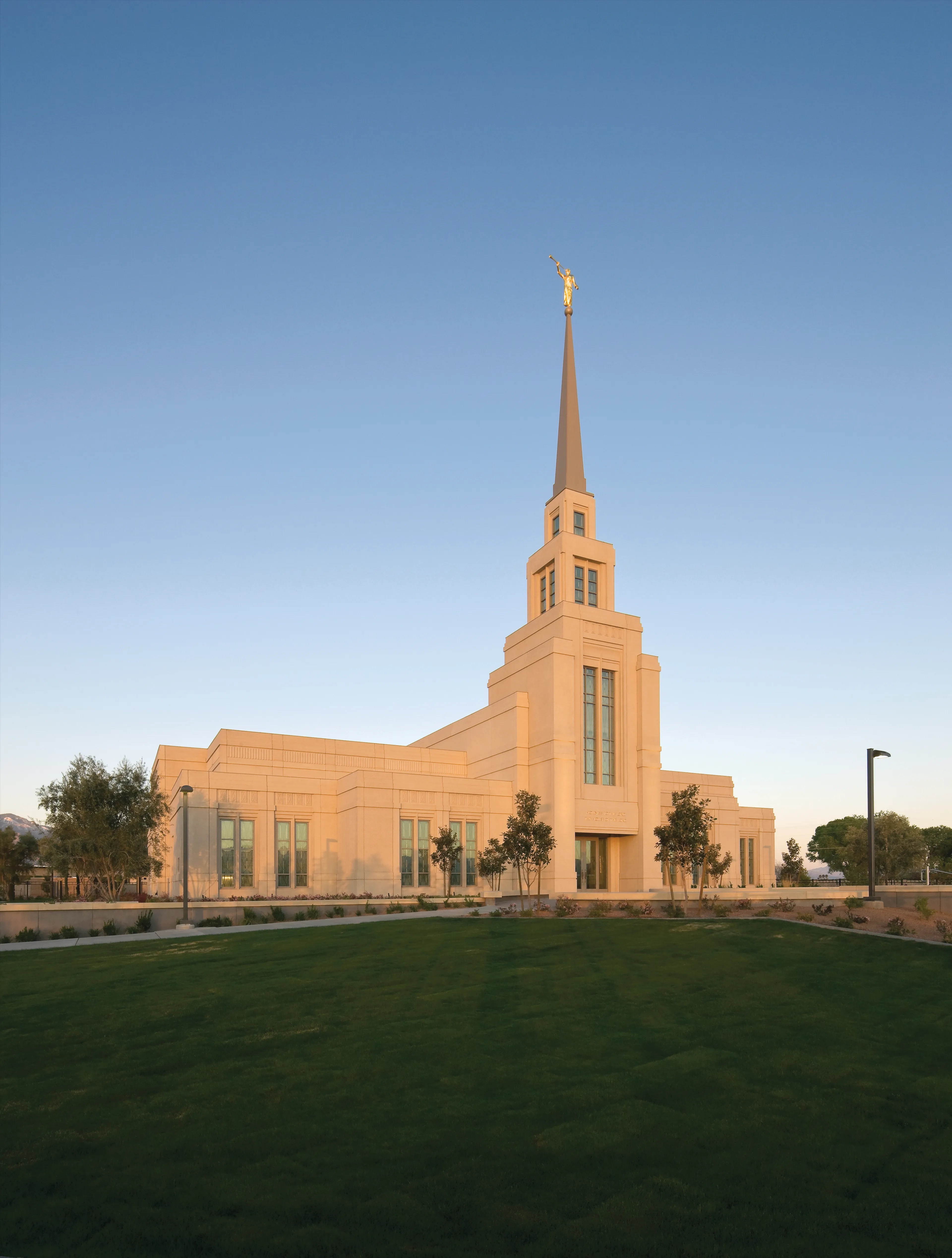 The Gila Valley Arizona Temple at sunset, including the grounds.