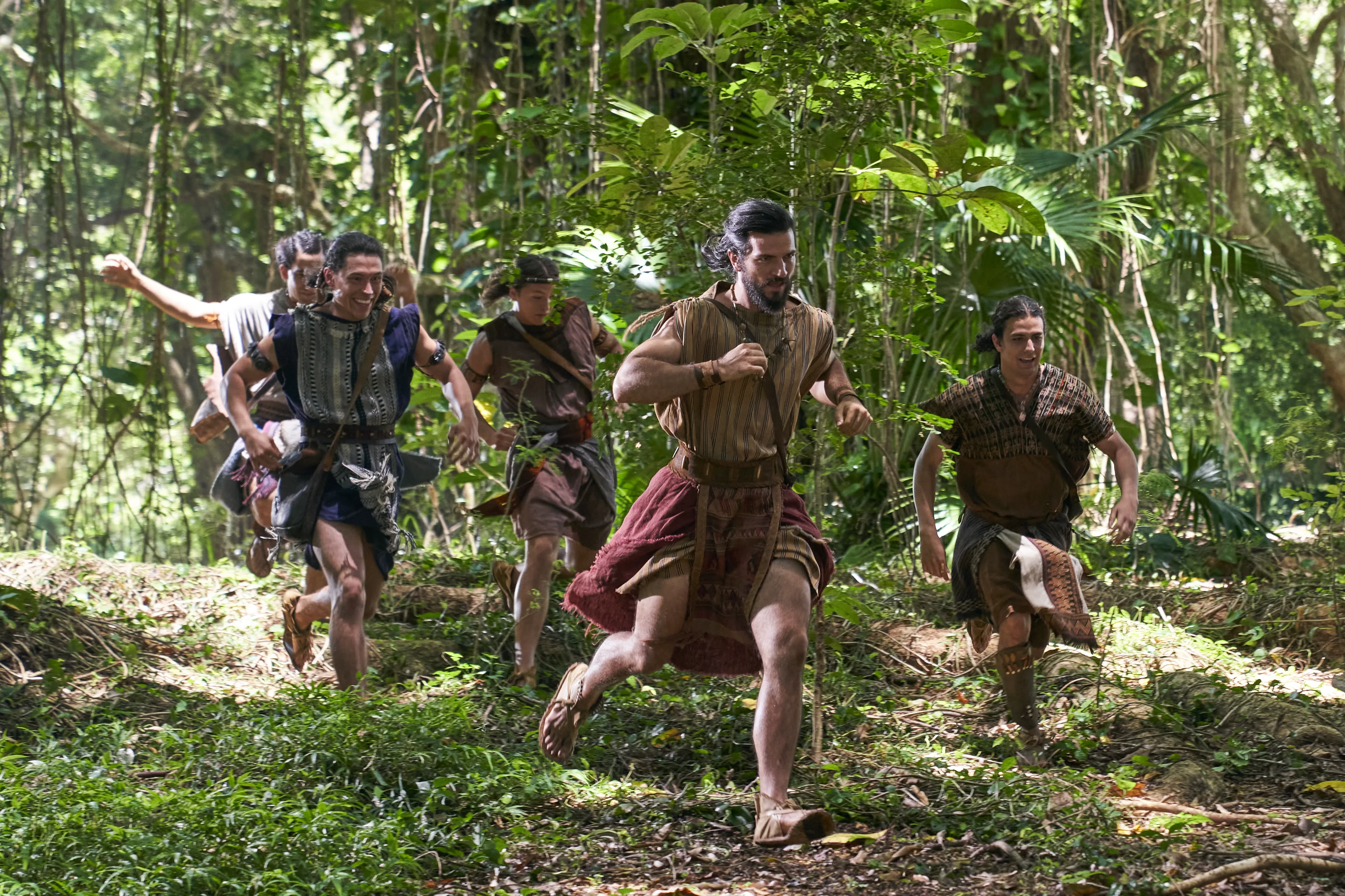 Alma the Younger and the Sons of Mosiah (Aaron, Ammon, Omner, and Himni) are running through the woods.