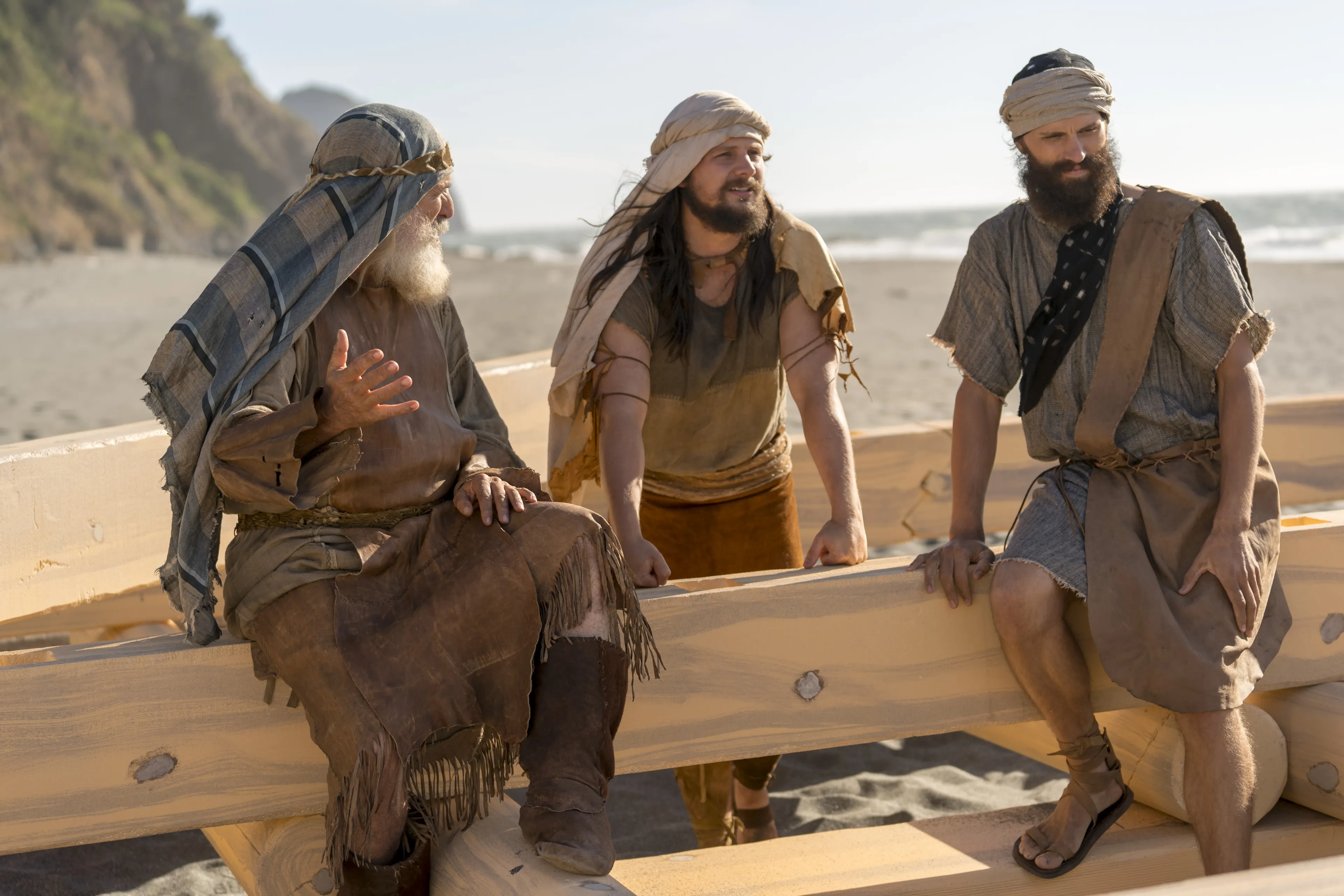 Lehi speaks with Ishmael's sons on the beach.