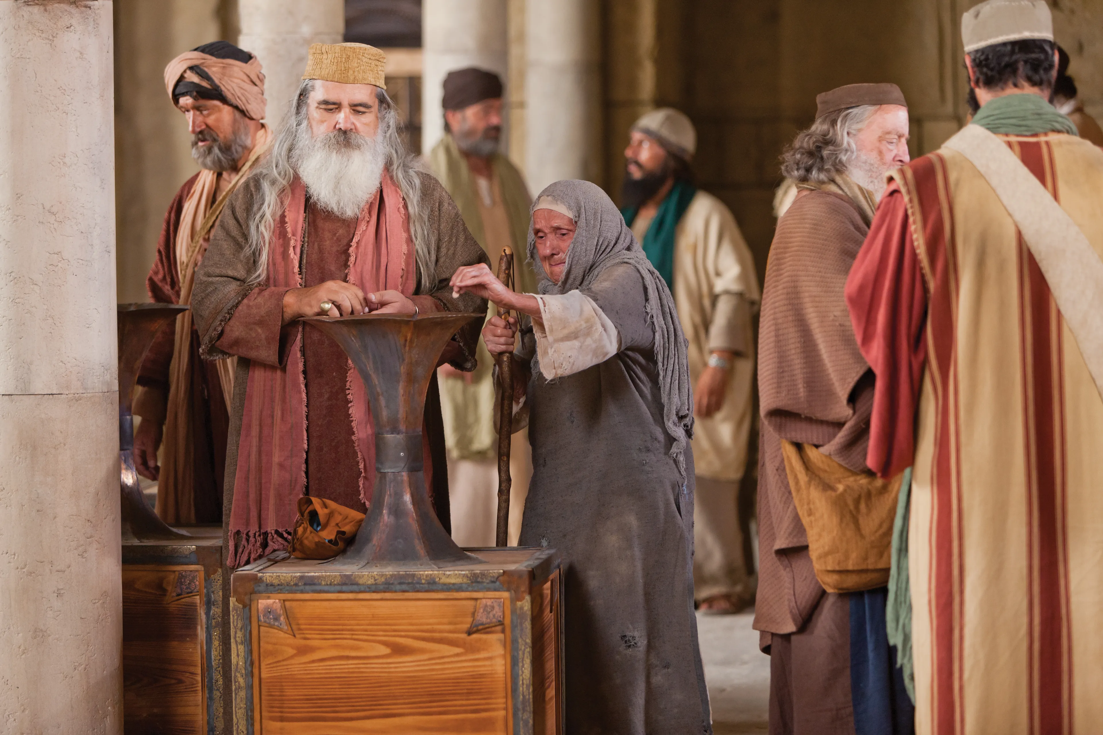 A poor widow places two small coins into the contribution containers in the court of the temple treasury.