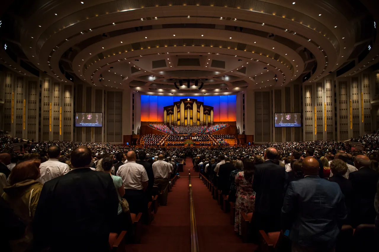 Inside of the conference center in Salt Lake full of people