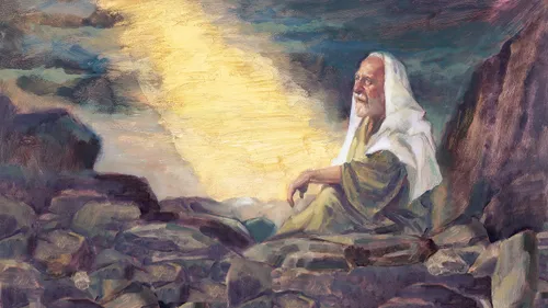 Elijah sitting among rocks with a ray of light shining on him