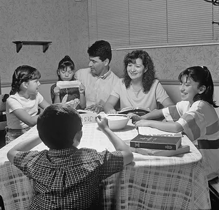 Family studying scriptures