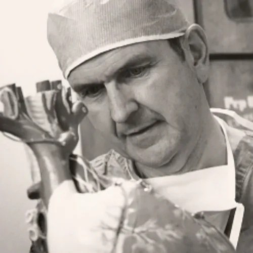 Russell M. Nelson looking at model of heart