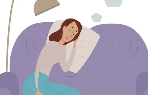 woman sleeping on couch