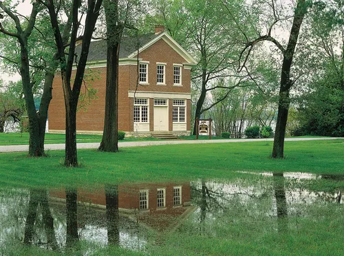 exterior view of two-story red brick building