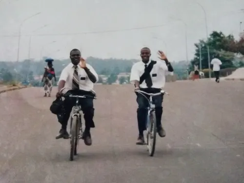 Géoffroy Koussemou and companion