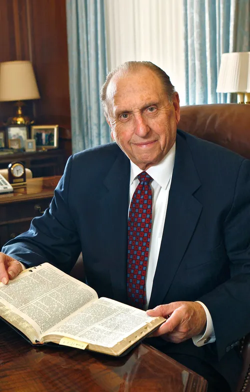 President Monson with scriptures