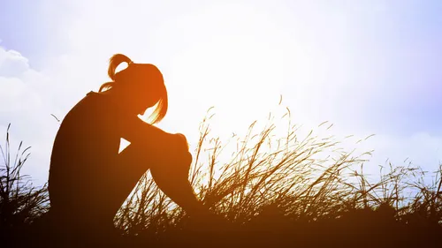 young woman thinking