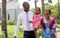 A Ghanan family walks the grounds of the Accra Ghana Temple together.