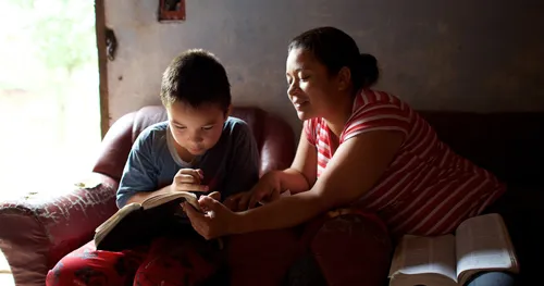 mother and son studying together