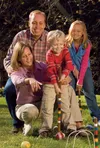 family playing croquet