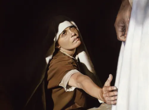 woman touching robe of Christ