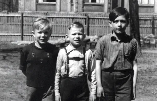 Young Elder Uchtdorf walking with friends
