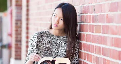 young woman reading scriptures