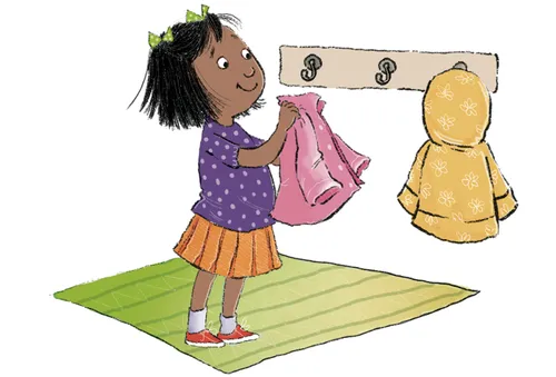 女孩把外套挂起来