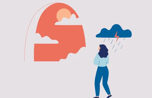 a woman standing under a cloud while looking at the sun