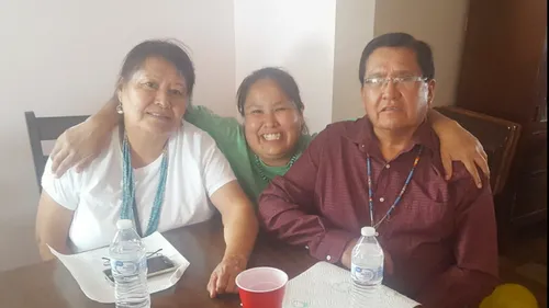 family sitting at table