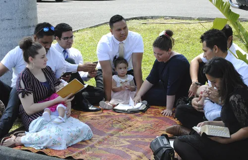Group of young adults in New Caledonia studying scriptures together