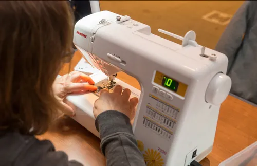 a woman at a sewing machine