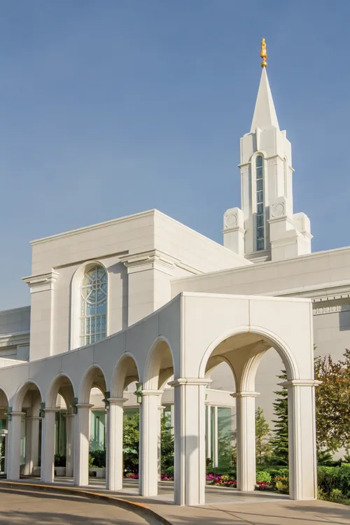 The front entrance to the Bountiful Utah Temple, with the temple’s arches in prominent view.
