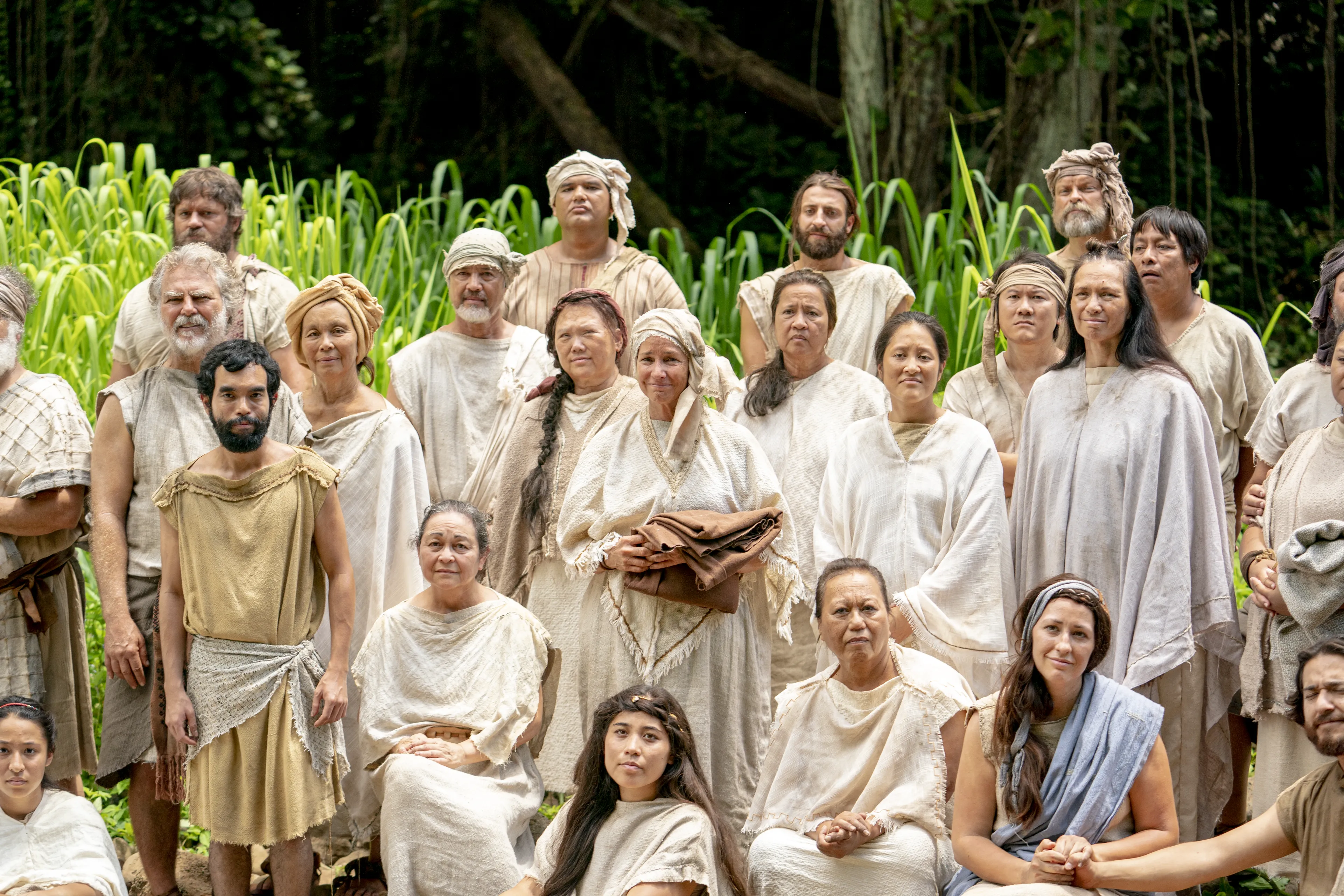 Alma prepares to baptize people at the Waters of Mormon.