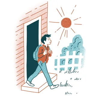 young man walking outside