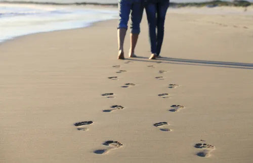 Couple walking on the beach
