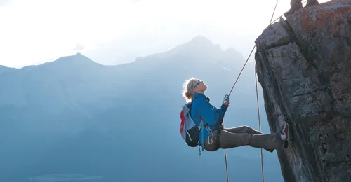 woman rappelling