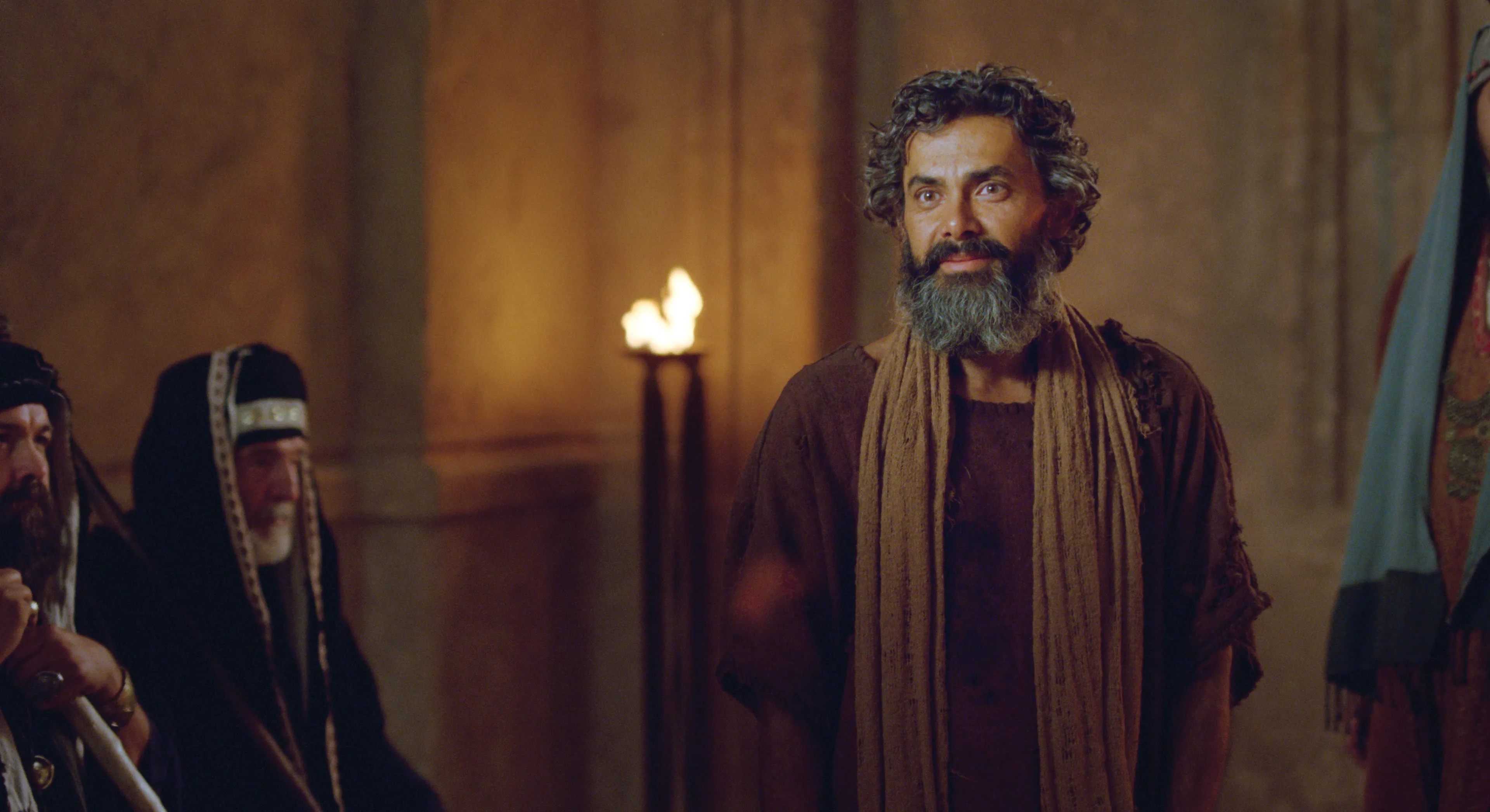 A man born blind tells the Pharisees of Christ's healing power.