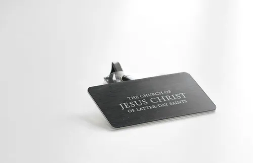 a nametag showing the full name of the Church