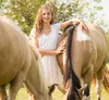 young woman with horses