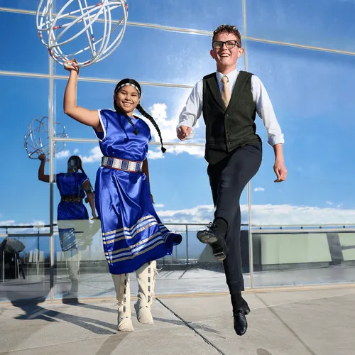 young woman and young man dancing