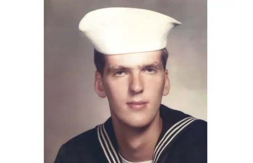 man in a navy uniform