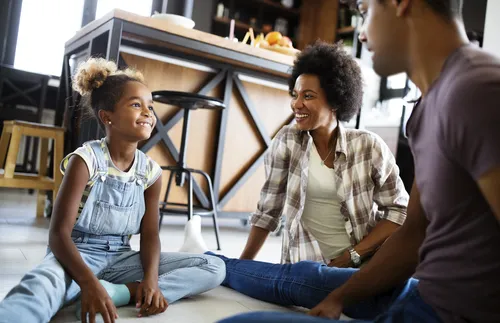 family sitting on the floor