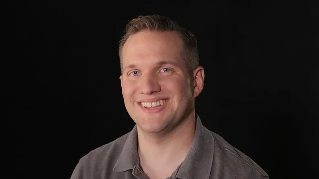 A man talks to camera about losing a child