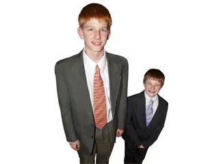 two young men, one tall, one short