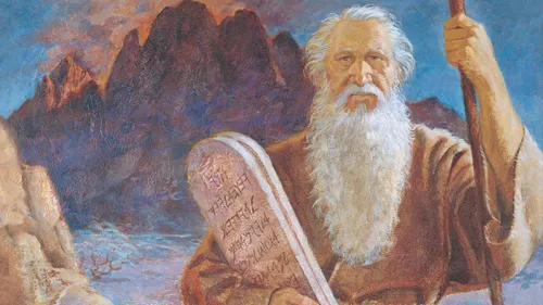 Moses carrying the Ten Commandments tablets