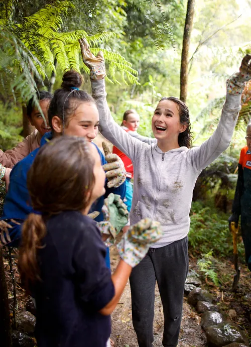 girls at camp laughing
