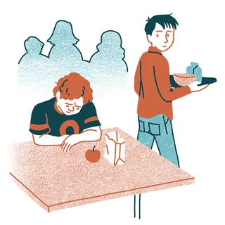 two young men, one of them is sad