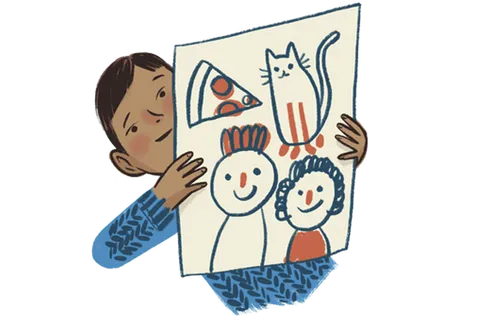 Boy holding up drawing