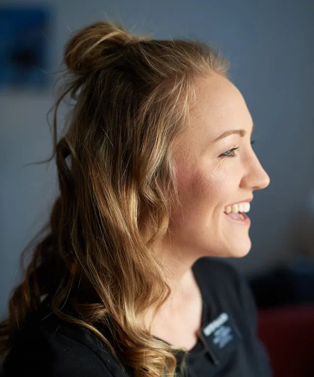Various sister missionaries model appropriate dress and attire. They are wearing approved shirts. They appear to be talking to other people nearby.