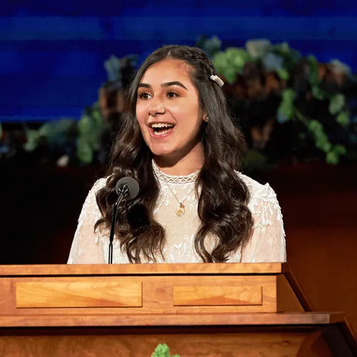 young woman at pulpit