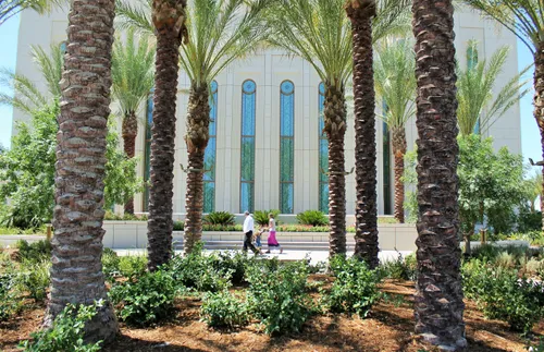 family standing in front of the temple