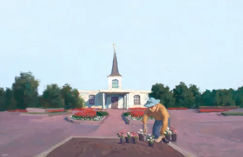 man working in garden on temple grounds