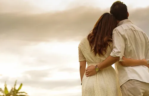 a couple looking into the distance