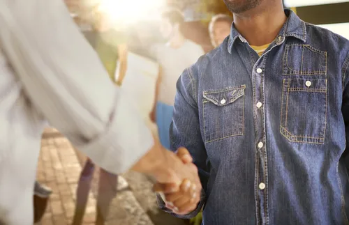 two men shaking hands