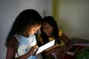 girls looking at iPad