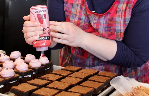 Molly decorating brownies