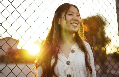 young adult woman smiling